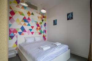 Posteľ alebo postele v izbe v ubytovaní RentPlanet - Apartament Sky Tower