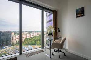 Televízia a/alebo spoločenská miestnosť v ubytovaní RentPlanet - Apartament Sky Tower
