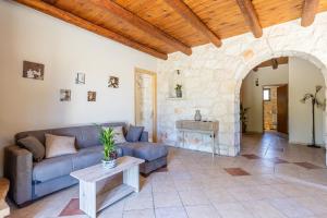 A seating area at Platanus Inn Apartments by "elite"