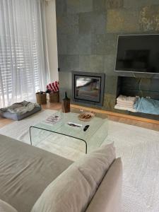 Телевизор и/или развлекательный центр в Summer Villa