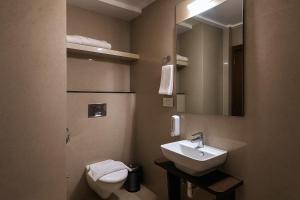 Koupelna v ubytování RION - A Boutique Hotel