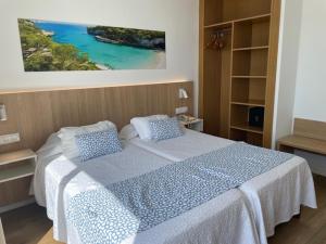 Letto o letti in una camera di Hotel Sultán