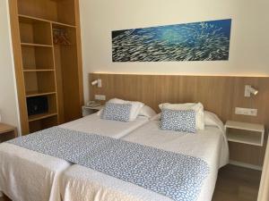 Letto o letti in una camera di Hotel Sultán