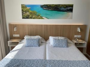 Letto o letti in una camera di Hotel Sultán