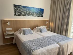 Letto o letti in una camera di Hotel Sultán