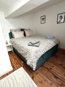 Le Cosy de Montfortにあるベッド