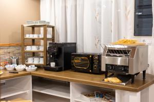 A kitchen or kitchenette at Airport Károly Centrál
