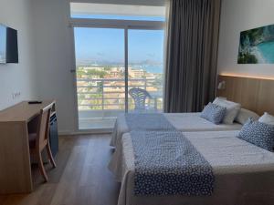 Letto o letti in una camera di Hotel Sultán