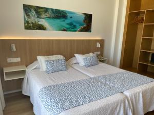 Letto o letti in una camera di Hotel Sultán