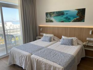 Letto o letti in una camera di Hotel Sultán
