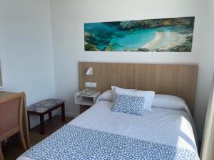 Letto o letti in una camera di Hotel Sultán