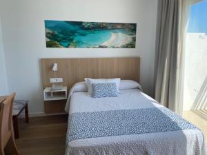 Letto o letti in una camera di Hotel Sultán