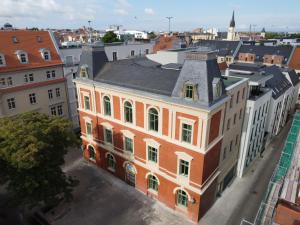 an aerial view of a building in a city at Zentrale Apartments I home2share in Halle an der Saale