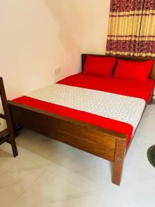 Voodi või voodid majutusasutuse Coco Resort & Villa toas