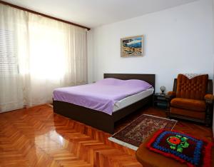 Postel nebo postele na pokoji v ubytování Apartment Boni