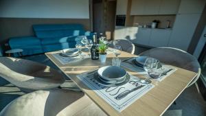 Zona de estar de Emma Living - neue stilvolle Ferienwohnungen in Peschiera del Garda - nur 2 km vom Gardasee entfernt