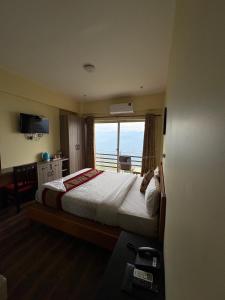 Llit o llits en una habitació de Hotel Green Valley Nagarkot