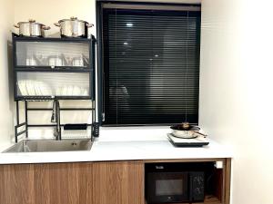 Kuchyň nebo kuchyňský kout v ubytování T3 City view 3 bedrooms 5 beds elevator free laundry