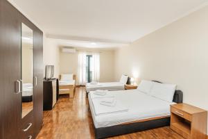 Apartmani Jakšić客房内的一张或多张床位