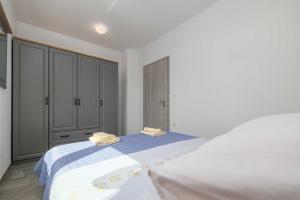 Posteľ alebo postele v izbe v ubytovaní Apartment Markič