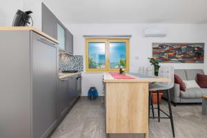 Kuchyňa alebo kuchynka v ubytovaní Apartment Markič