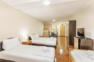 Apartmani Jakšić客房内的一张或多张床位