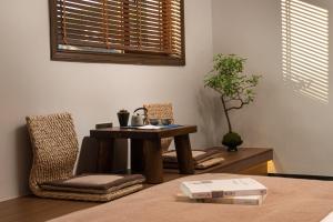 Zona d'estar a 凤凰古城树喜民宿店Shuxi Guesthouse- Fenghuang Ancient Town