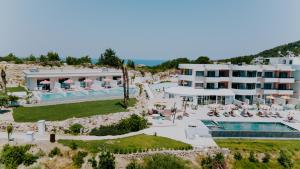 an aerial view of a resort with a swimming pool at The Palms Concept Hotel Adults Only 16 Plus in Faliraki