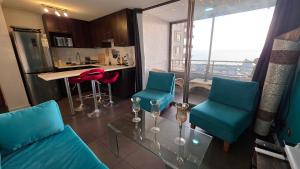 Η κουζίνα ή μικρή κουζίνα στο Oceana Suites Condominio Activo