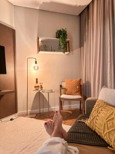 Summit Flat, ótima localização, limpeza diária, academia e piscina客房内的一张或多张床位