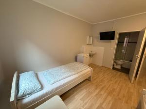 Postel nebo postele na pokoji v ubytování Rest Best L97