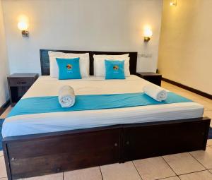 Letto o letti in una camera di Hotel Coral Bay