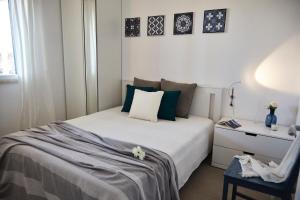 Ένα ή περισσότερα κρεβάτια σε δωμάτιο στο VILLA BY THE SEA - Accesso Privato al Mare +50 φωτογραφίες