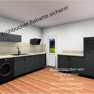 a kitchen with a sink and a washing machine at FeWo - LOFT Mosel & Weinquartier, Balkon, Parkplatz, moderne Küche, bis 8 Personen in Piesport +30 photos