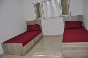 Postel nebo postele na pokoji v ubytování Djerba la douce