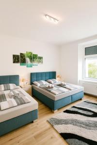 Postel nebo postele na pokoji v ubytování FELGRA Apartment #70