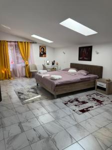 Postel nebo postele na pokoji v ubytování Rustic House + 17 fotografií