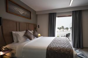Postel nebo postele na pokoji v ubytování Marbella Resort