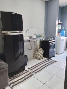 Nhà bếp/bếp nhỏ tại Apto próx de tudo com lazer e conforto COP30