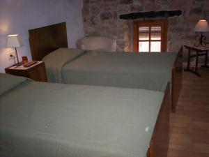 Posteľ alebo postele v izbe v ubytovaní Rural Horizons on La Ruta del Cister