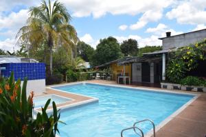 Πισίνα στο ή κοντά στο Hotel Cabañas Santa Rosa Suarez Tolima