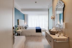 Postel nebo postele na pokoji v ubytování Hotel Planamar by Escampa Hotels