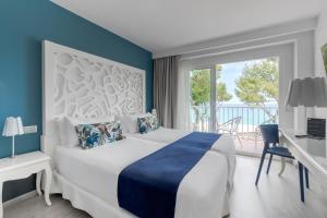 Postel nebo postele na pokoji v ubytování Hotel Planamar by Escampa Hotels