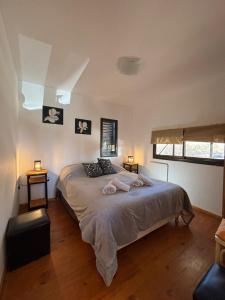 Ένα ή περισσότερα κρεβάτια σε δωμάτιο στο Casa Pie de montaña