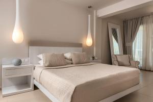 Voodi või voodid majutusasutuse Kassandra Bay Resort, Suites & Spa toas