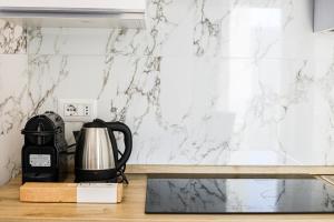 Lido ConchigliaにあるNettuno80 4 by Casa di Marco AP35のキッチン(コーヒーメーカー付)