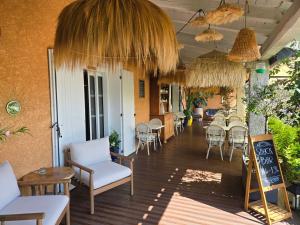 a restaurant with chairs and tables in a room at Hôtel Le SAINT-GENIÈS in Uzès +119 photos