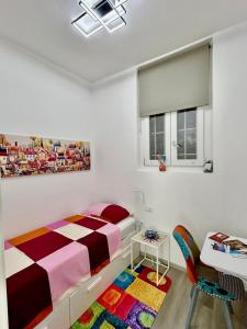 Postel nebo postele na pokoji v ubytování Valle Fiorita 42 - Garden apartment