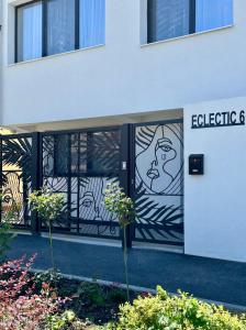 a glass door with a picture of a man on it at Eclectic 6 in Satu Mare