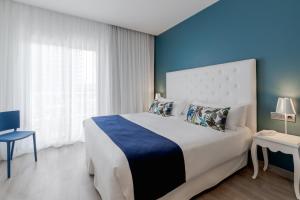 Postel nebo postele na pokoji v ubytování Hotel Planamar by Escampa Hotels